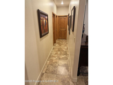 Quality home on the 11th fairway featuring 12 foot ceilings, gas on San Juan Country Club in New Mexico - for sale on GolfHomes.com, golf home, golf lot