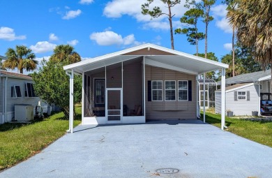 This newly renovated park home has 924 sq.ft. air conditioned on The Great Outdoors Golf and Country Club in Florida - for sale on GolfHomes.com, golf home, golf lot