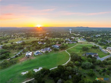 Experience refined living in this beautifully built 2022 home on Apple Rock Golf Course - Horseshoe Bay in Texas - for sale on GolfHomes.com, golf home, golf lot