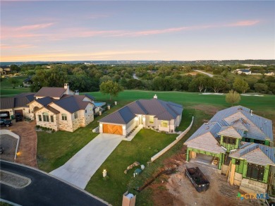 Experience refined living in this beautifully built 2022 home on Apple Rock Golf Course - Horseshoe Bay in Texas - for sale on GolfHomes.com, golf home, golf lot