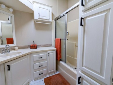 This newly renovated park home has 924 sq.ft. air conditioned on The Great Outdoors Golf and Country Club in Florida - for sale on GolfHomes.com, golf home, golf lot