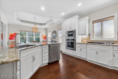 Located in the gated community of Compass Pointe in Leland, this on Compass Pointe Golf Course in North Carolina - for sale on GolfHomes.com, golf home, golf lot