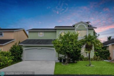 Nestled in the heart of Doral Park, this stunning 4-bedroom, 2 on Jim McLean Signature Course in Florida - for sale on GolfHomes.com, golf home, golf lot