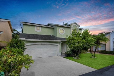 Nestled in the heart of Doral Park, this stunning 4-bedroom, 2 on Jim McLean Signature Course in Florida - for sale on GolfHomes.com, golf home, golf lot