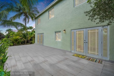 Nestled in the heart of Doral Park, this stunning 4-bedroom, 2 on Jim McLean Signature Course in Florida - for sale on GolfHomes.com, golf home, golf lot