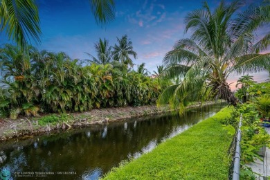 Nestled in the heart of Doral Park, this stunning 4-bedroom, 2 on Jim McLean Signature Course in Florida - for sale on GolfHomes.com, golf home, golf lot