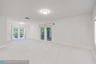 Nestled in the heart of Doral Park, this stunning 4-bedroom, 2 on Jim McLean Signature Course in Florida - for sale on GolfHomes.com, golf home, golf lot