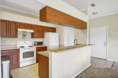 This beautiful second-floor Eagle Pond condo in the 24/7 on Cypresswood Golf and Country Club in Florida - for sale on GolfHomes.com, golf home, golf lot
