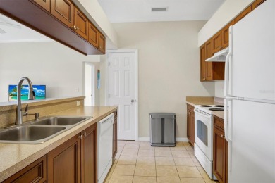 This beautiful second-floor Eagle Pond condo in the 24/7 on Cypresswood Golf and Country Club in Florida - for sale on GolfHomes.com, golf home, golf lot