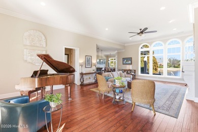 Some homes capture water views. This one lives in them. Custom on Ocean Ridge Plantation in North Carolina - for sale on GolfHomes.com, golf home, golf lot