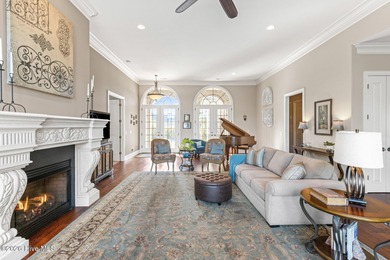 Some homes capture water views. This one lives in them. Custom on Ocean Ridge Plantation in North Carolina - for sale on GolfHomes.com, golf home, golf lot