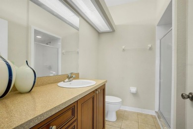 This beautiful second-floor Eagle Pond condo in the 24/7 on Cypresswood Golf and Country Club in Florida - for sale on GolfHomes.com, golf home, golf lot