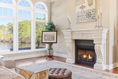 Some homes capture water views. This one lives in them. Custom on Ocean Ridge Plantation in North Carolina - for sale on GolfHomes.com, golf home, golf lot