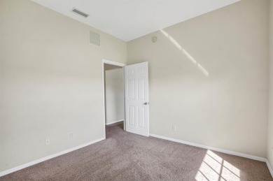 This beautiful second-floor Eagle Pond condo in the 24/7 on Cypresswood Golf and Country Club in Florida - for sale on GolfHomes.com, golf home, golf lot