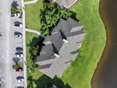 This beautiful second-floor Eagle Pond condo in the 24/7 on Cypresswood Golf and Country Club in Florida - for sale on GolfHomes.com, golf home, golf lot