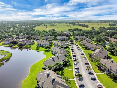 This beautiful second-floor Eagle Pond condo in the 24/7 on Cypresswood Golf and Country Club in Florida - for sale on GolfHomes.com, golf home, golf lot