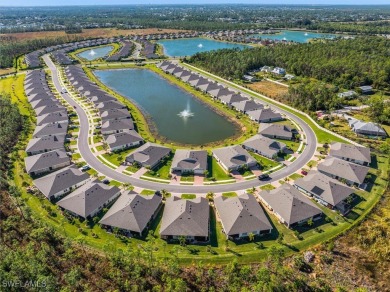 This coastal contemporary home with private preserve view will on Herons Glen Golf and Country Club in Florida - for sale on GolfHomes.com, golf home, golf lot