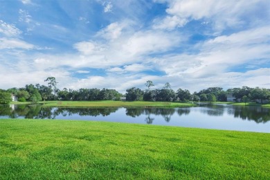 This beautiful second-floor Eagle Pond condo in the 24/7 on Cypresswood Golf and Country Club in Florida - for sale on GolfHomes.com, golf home, golf lot