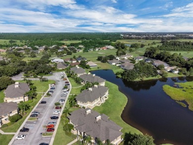 This beautiful second-floor Eagle Pond condo in the 24/7 on Cypresswood Golf and Country Club in Florida - for sale on GolfHomes.com, golf home, golf lot