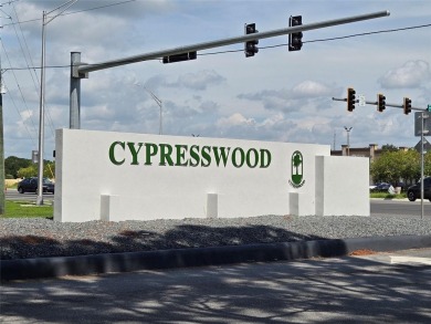 Price update!!! This beautiful condo in the 24/7 guard-gated on Cypresswood Golf and Country Club in Florida - for sale on GolfHomes.com, golf home, golf lot