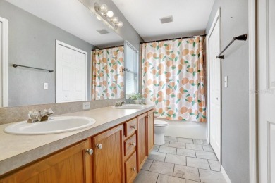 Welcome to this beautifully maintained 3-bedroom, 2-bath home on Summerfield Crossing Golf Club in Florida - for sale on GolfHomes.com, golf home, golf lot