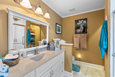 Welcome to 6713 Wisteria Dr! This charming 3-bedroom, 2-bathroom on Heron Point Golf Club in South Carolina - for sale on GolfHomes.com, golf home, golf lot