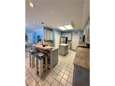 Welcome to 14114 La Blanquilla Drive located in the desirable on Padre Isles Golf Course in Texas - for sale on GolfHomes.com, golf home, golf lot