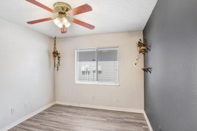 Welcome to this beautifully maintained 3-bedroom, 2-bath home on Summerfield Crossing Golf Club in Florida - for sale on GolfHomes.com, golf home, golf lot