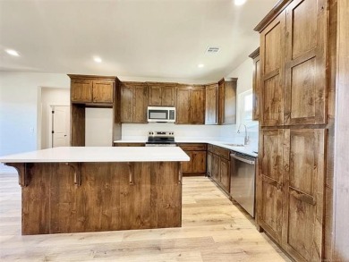 Well-designed Craftsman home with a modern edge. 3 Bed, 2 Bath on Cherry Springs Golf Club in Oklahoma - for sale on GolfHomes.com, golf home, golf lot