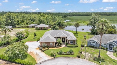 Are you looking for a completely remodeled lakefront home on 5 on Sun Air Golf Course in Florida - for sale on GolfHomes.com, golf home, golf lot