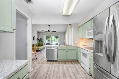 Welcome to this beautifully maintained 3-bedroom, 2-bath home on Summerfield Crossing Golf Club in Florida - for sale on GolfHomes.com, golf home, golf lot