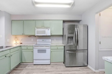 Welcome to this beautifully maintained 3-bedroom, 2-bath home on Summerfield Crossing Golf Club in Florida - for sale on GolfHomes.com, golf home, golf lot