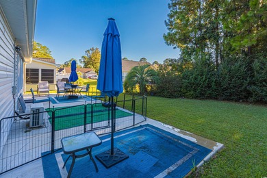 Welcome to 6713 Wisteria Dr! This charming 3-bedroom, 2-bathroom on Heron Point Golf Club in South Carolina - for sale on GolfHomes.com, golf home, golf lot