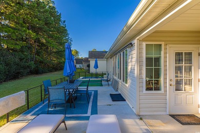 Welcome to 6713 Wisteria Dr! This charming 3-bedroom, 2-bathroom on Heron Point Golf Club in South Carolina - for sale on GolfHomes.com, golf home, golf lot