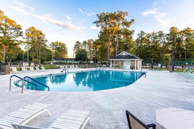 Welcome to 6713 Wisteria Dr! This charming 3-bedroom, 2-bathroom on Heron Point Golf Club in South Carolina - for sale on GolfHomes.com, golf home, golf lot