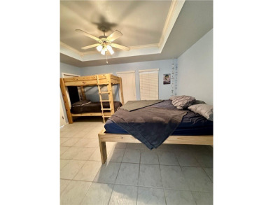 Welcome to 14114 La Blanquilla Drive located in the desirable on Padre Isles Golf Course in Texas - for sale on GolfHomes.com, golf home, golf lot