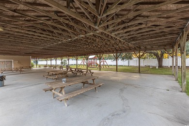 Welcome to 6713 Wisteria Dr! This charming 3-bedroom, 2-bathroom on Heron Point Golf Club in South Carolina - for sale on GolfHomes.com, golf home, golf lot