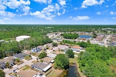 Welcome to this beautifully maintained 3-bedroom, 2-bath home on Summerfield Crossing Golf Club in Florida - for sale on GolfHomes.com, golf home, golf lot