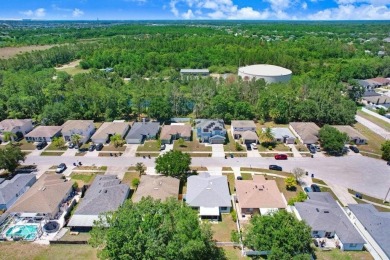 Welcome to this beautifully maintained 3-bedroom, 2-bath home on Summerfield Crossing Golf Club in Florida - for sale on GolfHomes.com, golf home, golf lot