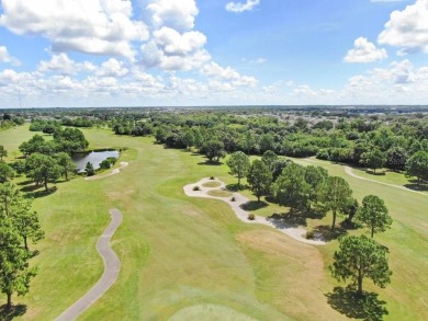 Welcome to this beautifully maintained 3-bedroom, 2-bath home on Summerfield Crossing Golf Club in Florida - for sale on GolfHomes.com, golf home, golf lot