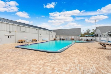 Welcome to this beautifully maintained 3-bedroom, 2-bath home on Summerfield Crossing Golf Club in Florida - for sale on GolfHomes.com, golf home, golf lot