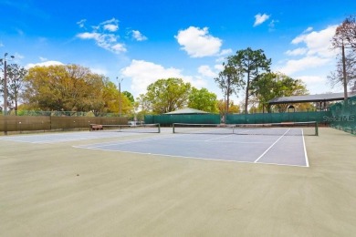 Welcome to this beautifully maintained 3-bedroom, 2-bath home on Summerfield Crossing Golf Club in Florida - for sale on GolfHomes.com, golf home, golf lot