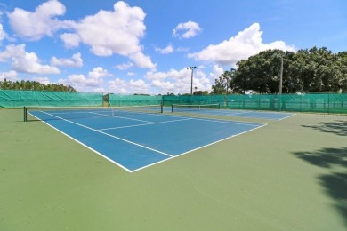 Welcome to this beautifully maintained 3-bedroom, 2-bath home on Summerfield Crossing Golf Club in Florida - for sale on GolfHomes.com, golf home, golf lot