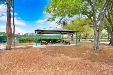 Welcome to this beautifully maintained 3-bedroom, 2-bath home on Summerfield Crossing Golf Club in Florida - for sale on GolfHomes.com, golf home, golf lot
