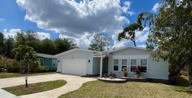 Beautifully renovated 2bd/2ba stucco home. Open concept layout on Del Tura Golf and Country Club in Florida - for sale on GolfHomes.com, golf home, golf lot