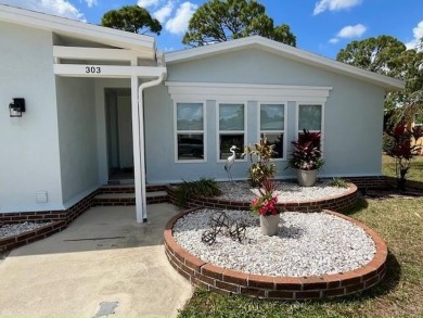 Beautifully renovated 2bd/2ba stucco home. Open concept layout on Del Tura Golf and Country Club in Florida - for sale on GolfHomes.com, golf home, golf lot