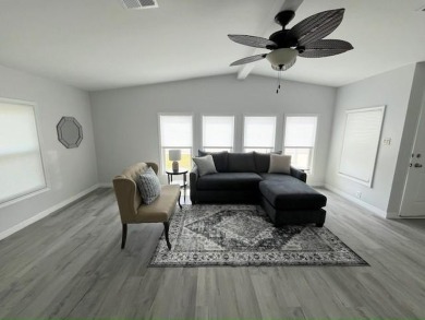 Beautifully renovated 2bd/2ba stucco home. Open concept layout on Del Tura Golf and Country Club in Florida - for sale on GolfHomes.com, golf home, golf lot