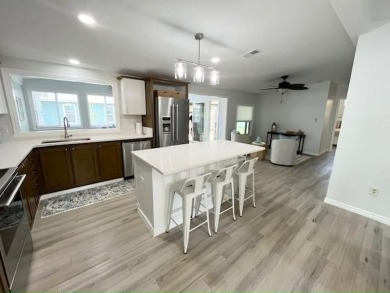 Beautifully renovated 2bd/2ba stucco home. Open concept layout on Del Tura Golf and Country Club in Florida - for sale on GolfHomes.com, golf home, golf lot