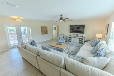 Coastal luxury meets resort-style living in this updated 3,000 on Gulf Harbors Golf Course in Florida - for sale on GolfHomes.com, golf home, golf lot