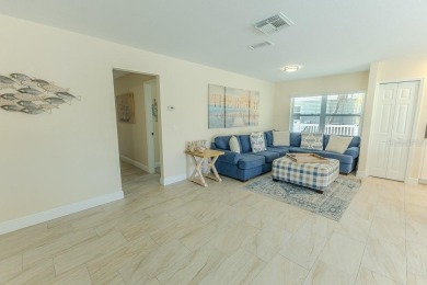Coastal luxury meets resort-style living in this updated 3,000 on Gulf Harbors Golf Course in Florida - for sale on GolfHomes.com, golf home, golf lot